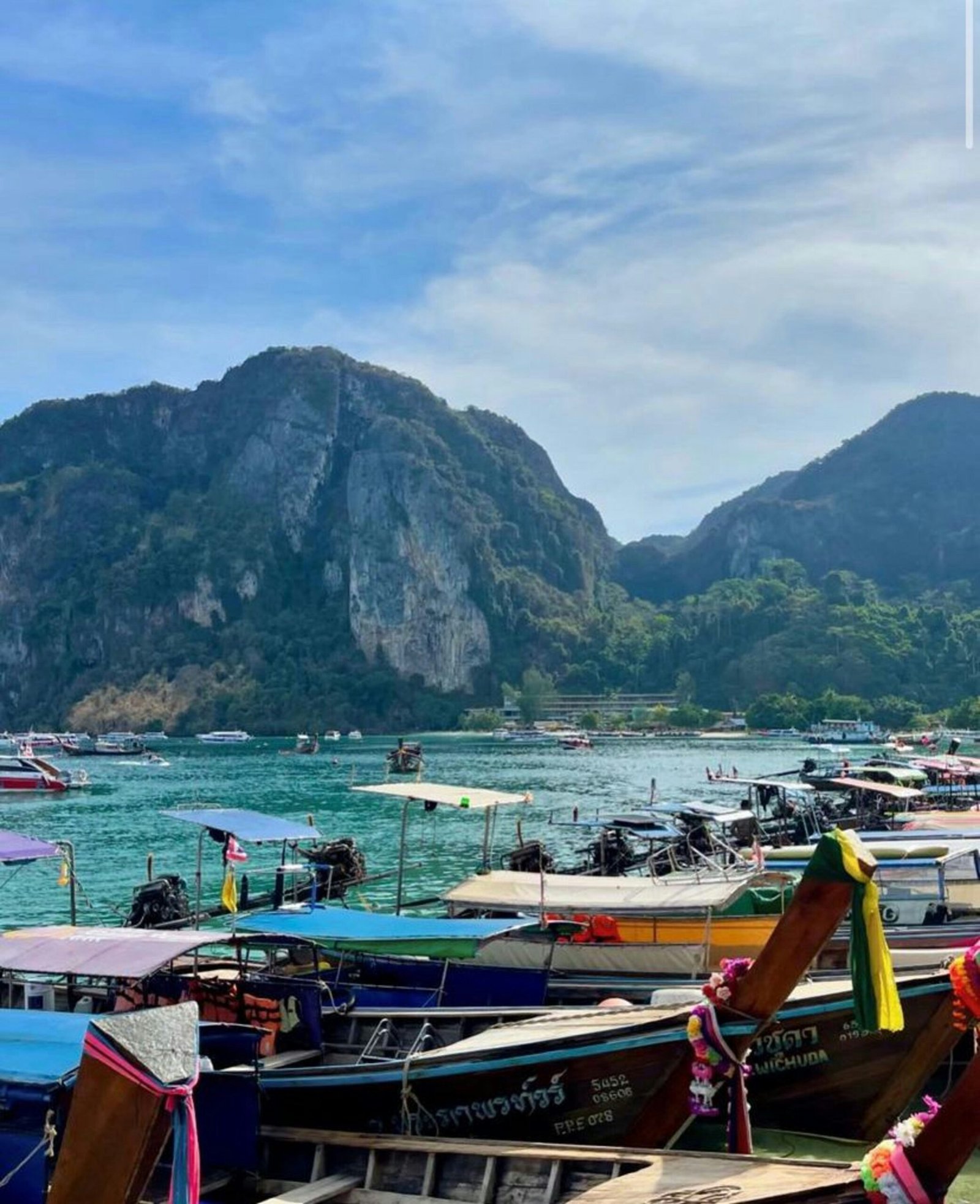 a bunch of boats that are sitting in the water