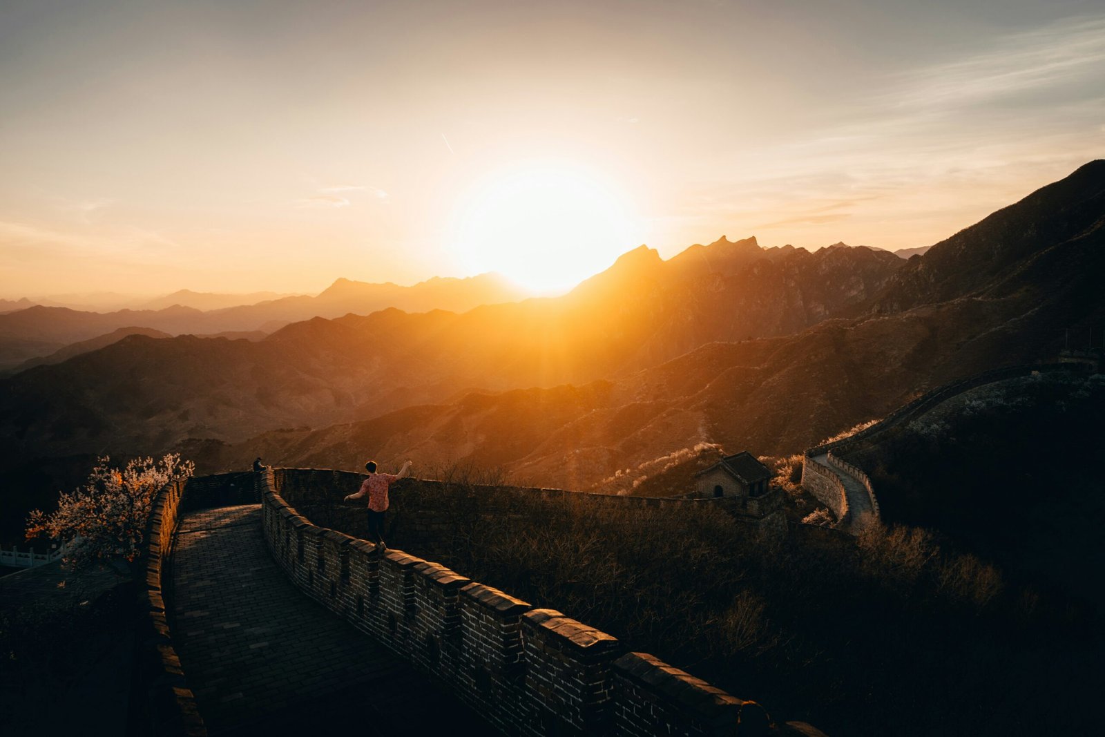 person walking on walls of Great Wall of China